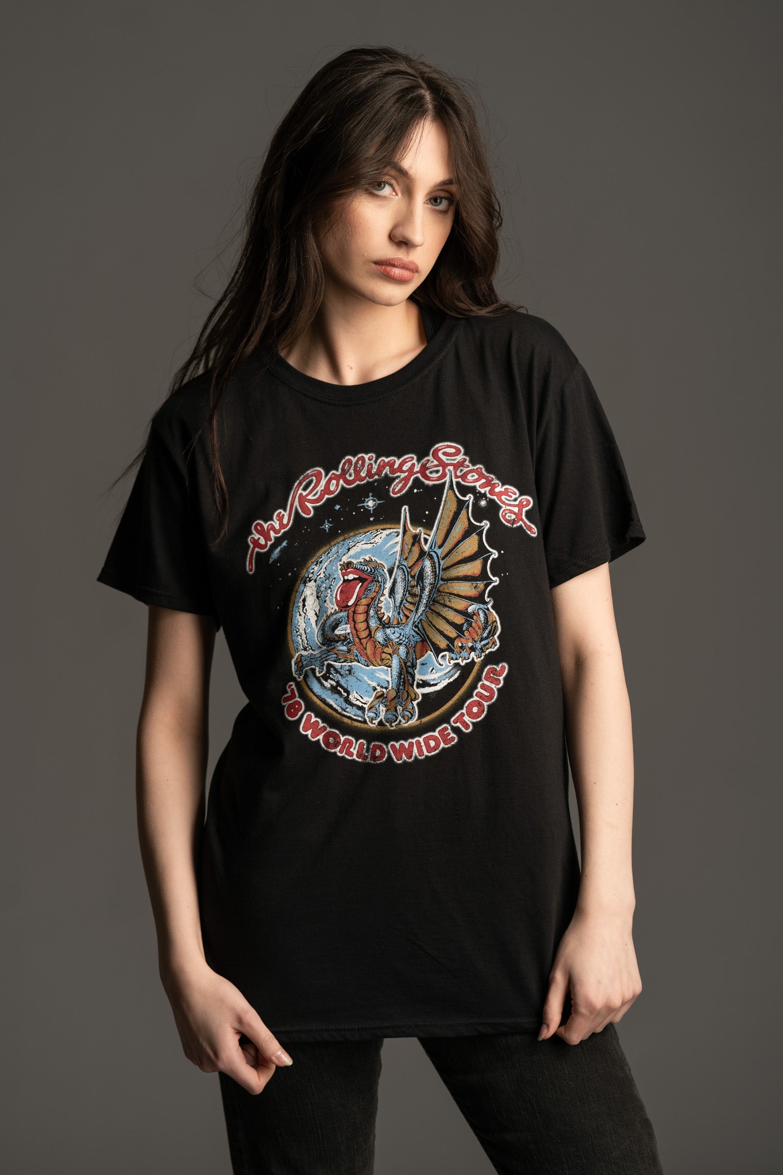 Andie wears Little Lies black Rolling Stones Dragon Band Tee with world tour style print