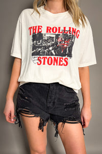 Rolling Stones Graffiti band tee in off-white, front model view showing vintage street art graphic and bold red logo