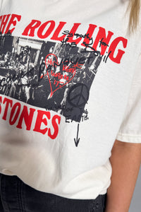Close-up of Rolling Stones Graffiti band tee showing handwritten graffiti details and bold red logo print