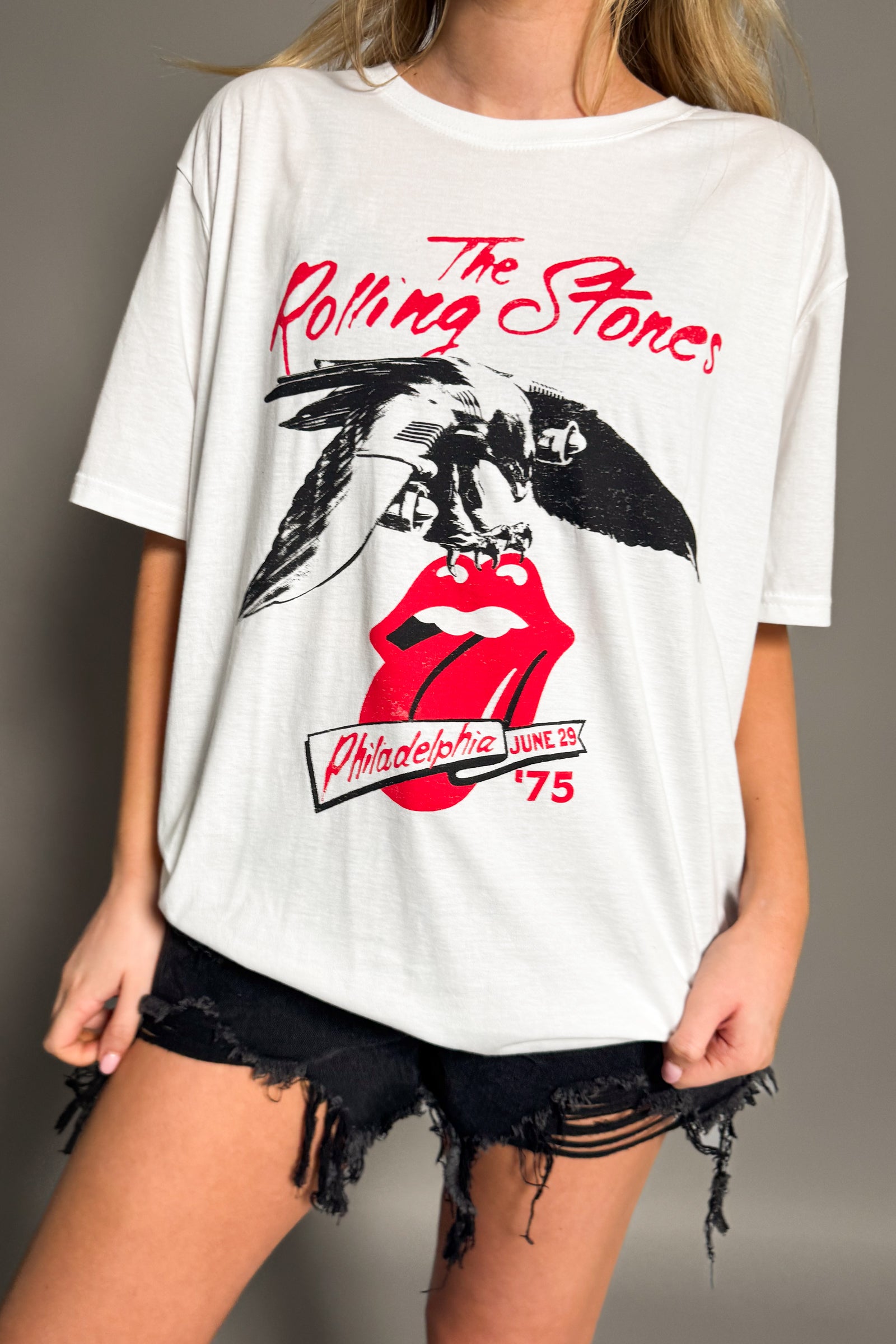 Front view of the Rolling Stones Philadelphia 1975 band t-shirt in off-white.