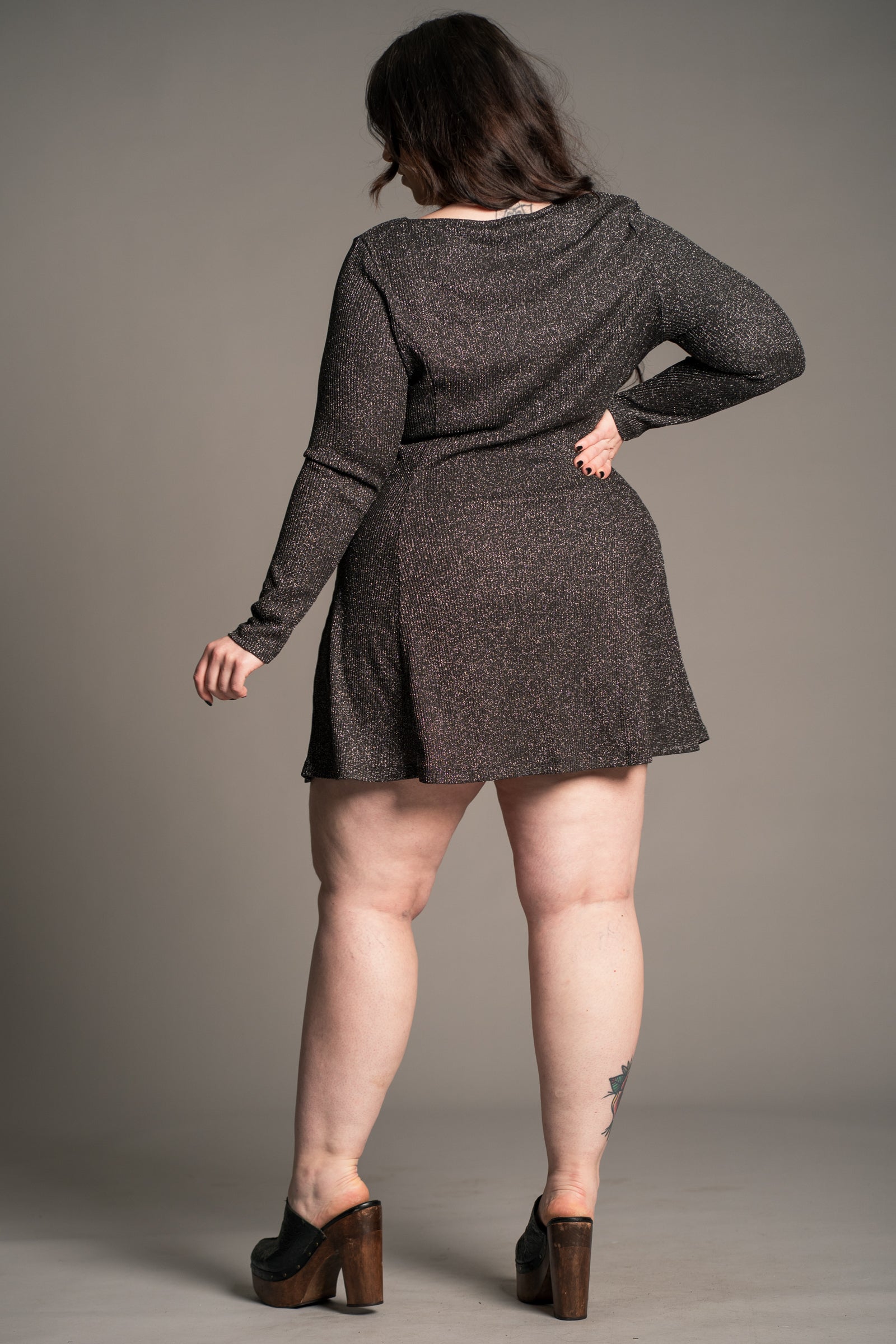 Back view of Little Lies Sweet Jane Gunmetal Shimmer Mini Dress showing fit-and-flare shape in metallic ribbed fabric