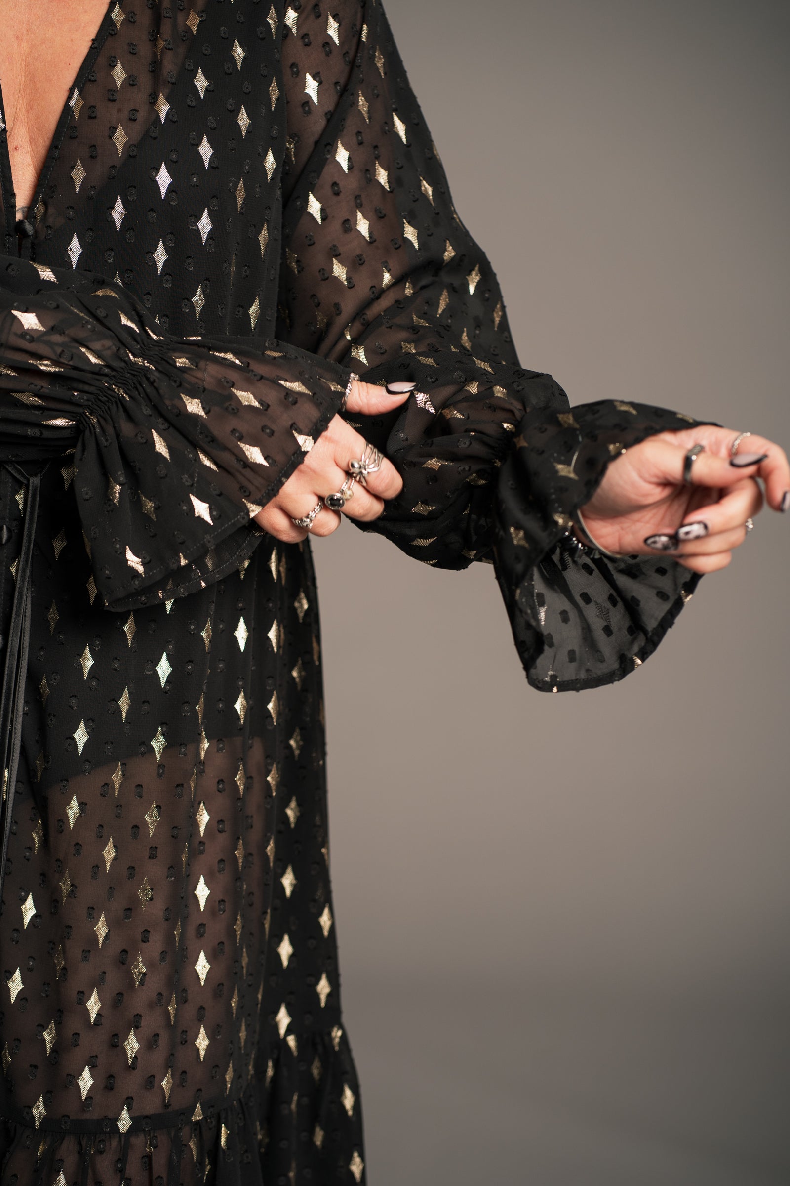 Space Oddity Metallic Maxi, gold metallic motifs catching the light