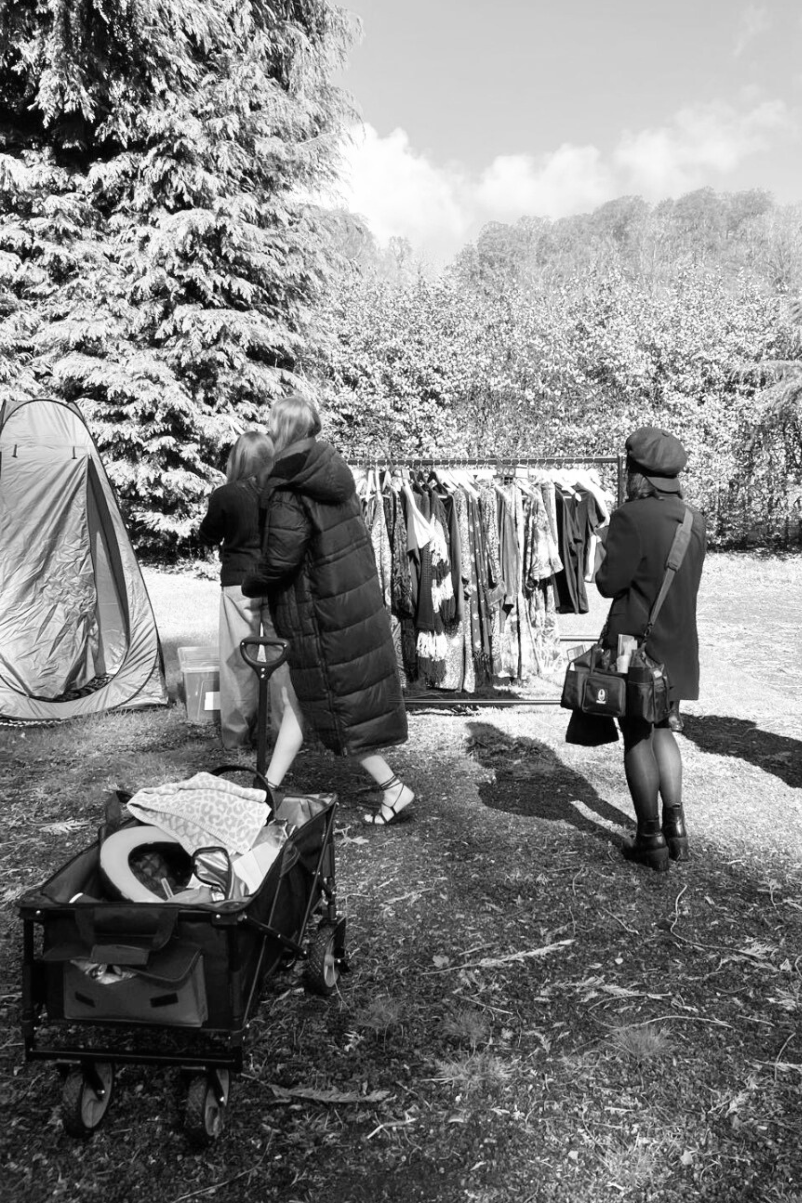 Photoshoot scenes, with model, team, clothing and bad boy transport trolley!