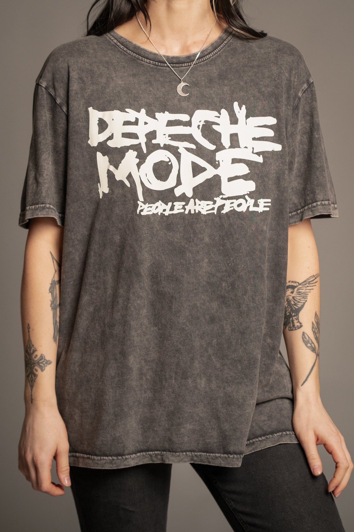 Close-up of Victoria wearing the Depeche Mode People Are People band T-shirt with cream graphic