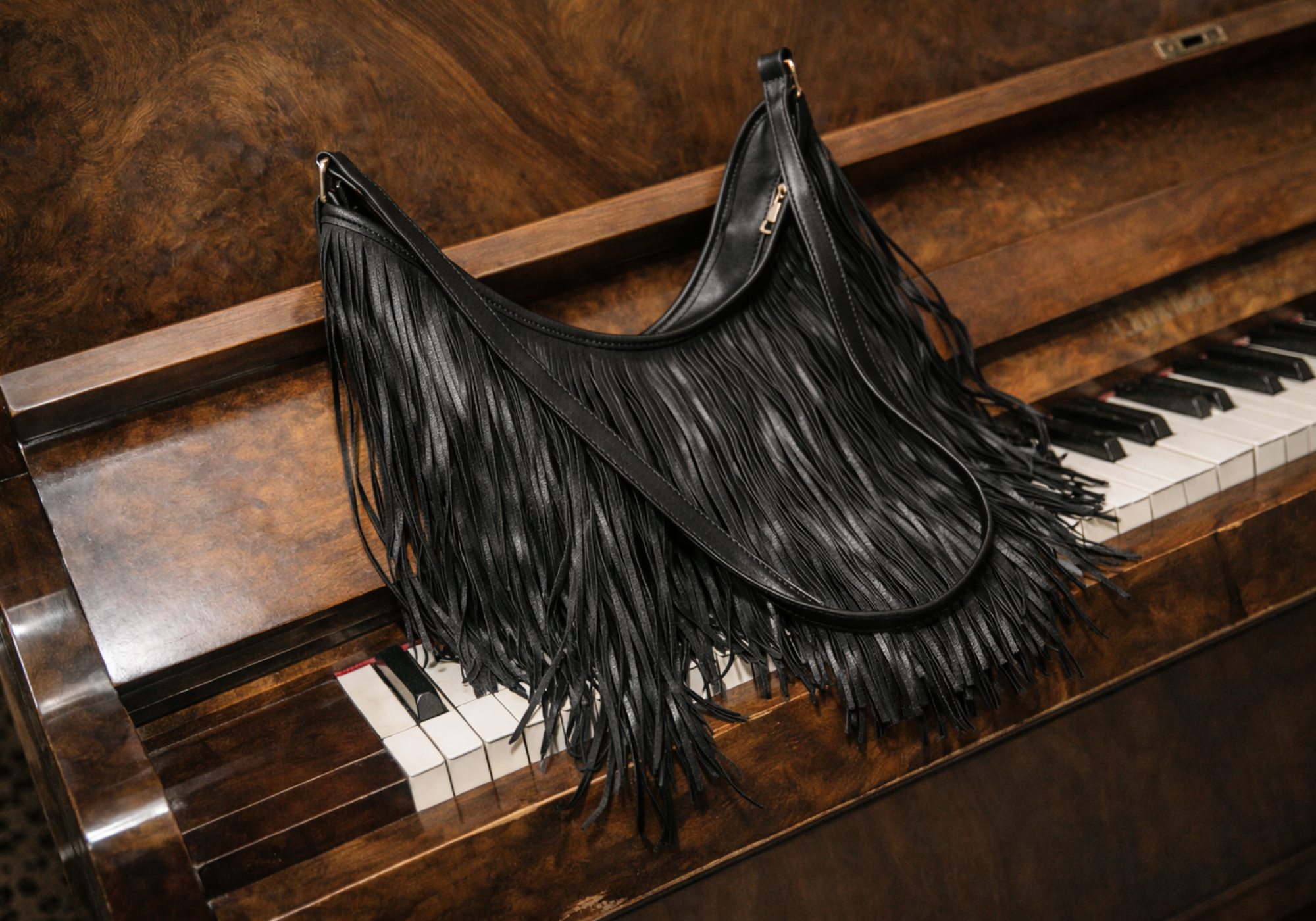 Little Lies Rhiannon Black Faux Leather Fringed shoulder bag with long fringe detailing and gold hardware