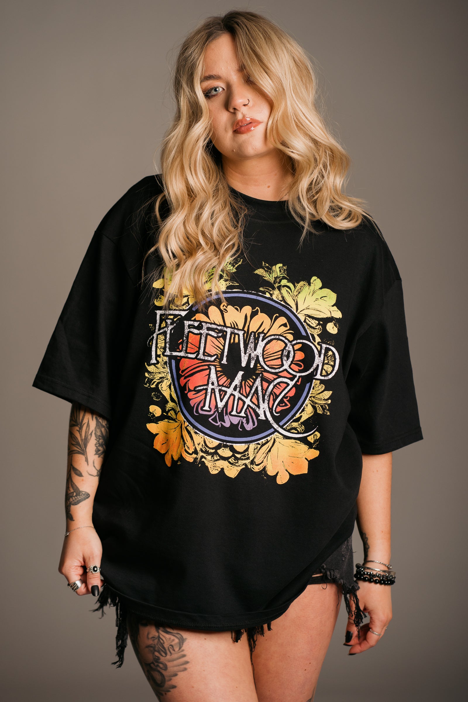 Side profile of Fleetwood Mac Floral Oversize Band Tee showing oversized relaxed fit
