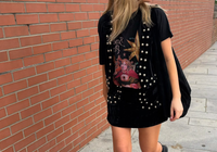 Model wearing Little Lies The Smashing Pumpkins celestial band tee styled with Lennon studded velvet waistcoat and matching mini skirt in black for vintage-inspired rock and boho styling