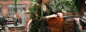 Dakota Olive Devore Kimono by Little Lies featuring velvet burnout detailing, fringe trim and a flowing bohemian silhouette styled with a tan suede fringe bag
