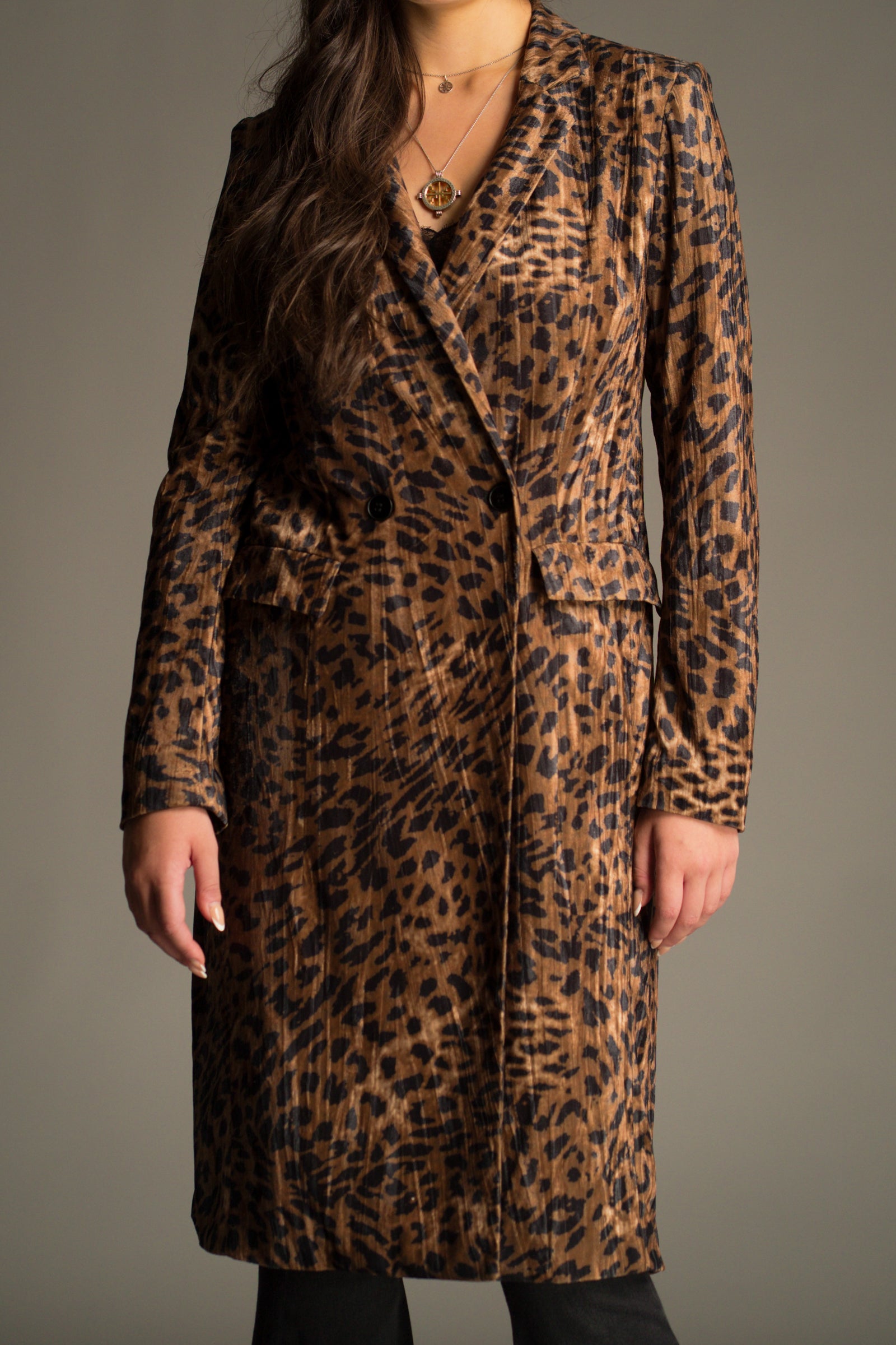 Front detail shot of the Jagger Leopard Velvet Duster Coat showing double breasted closure and longline tailored silhouette.