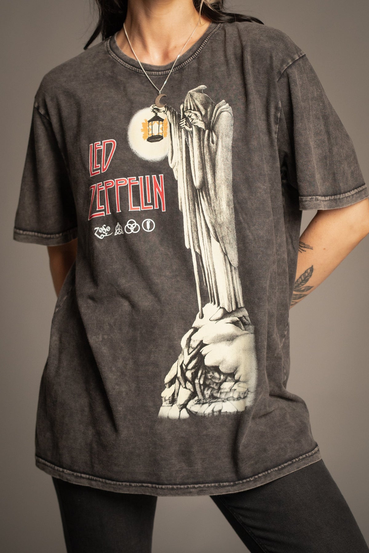 Close-up of Victoria wearing the Led Zeppelin Hermit Tarot band T-shirt with tarot-inspired artwork