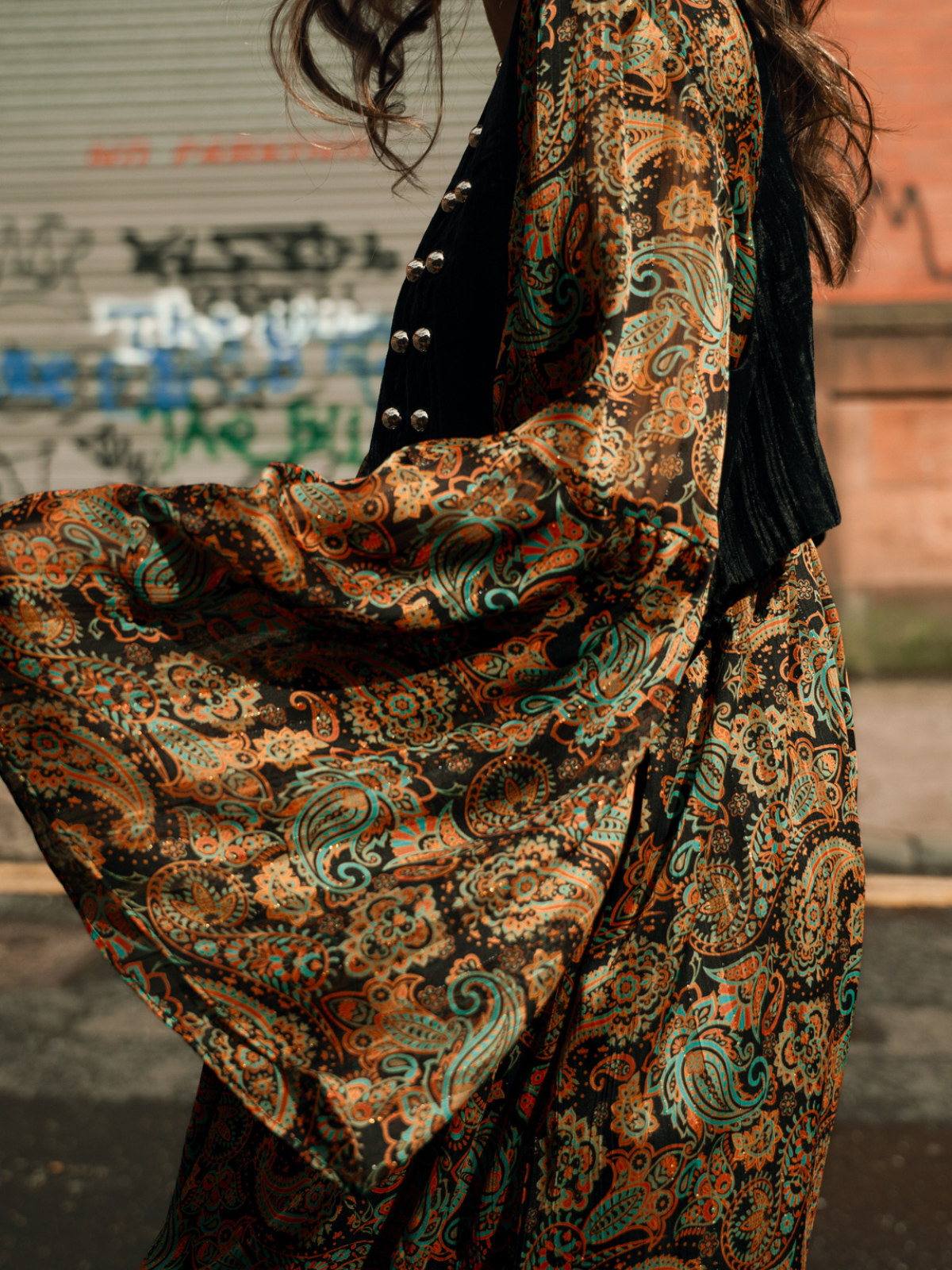 Close-up of Little Lies Ringo Paisley Smock Dress fabric and paisley print detail