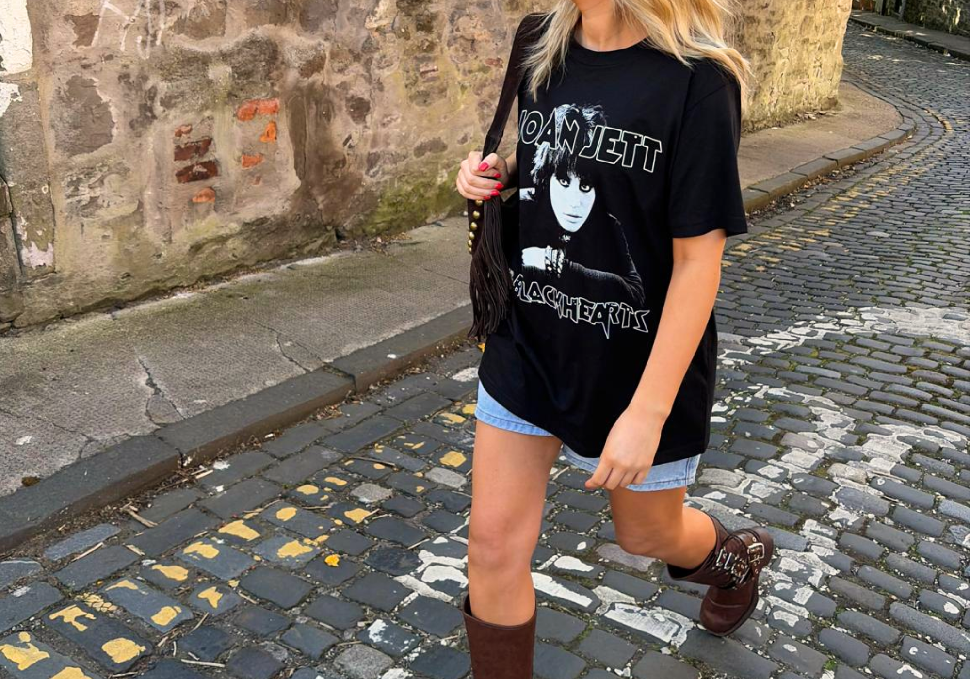 Little Lies Joan Jett and The Blackhearts Band Tee in black, styled with denim shorts, street style.