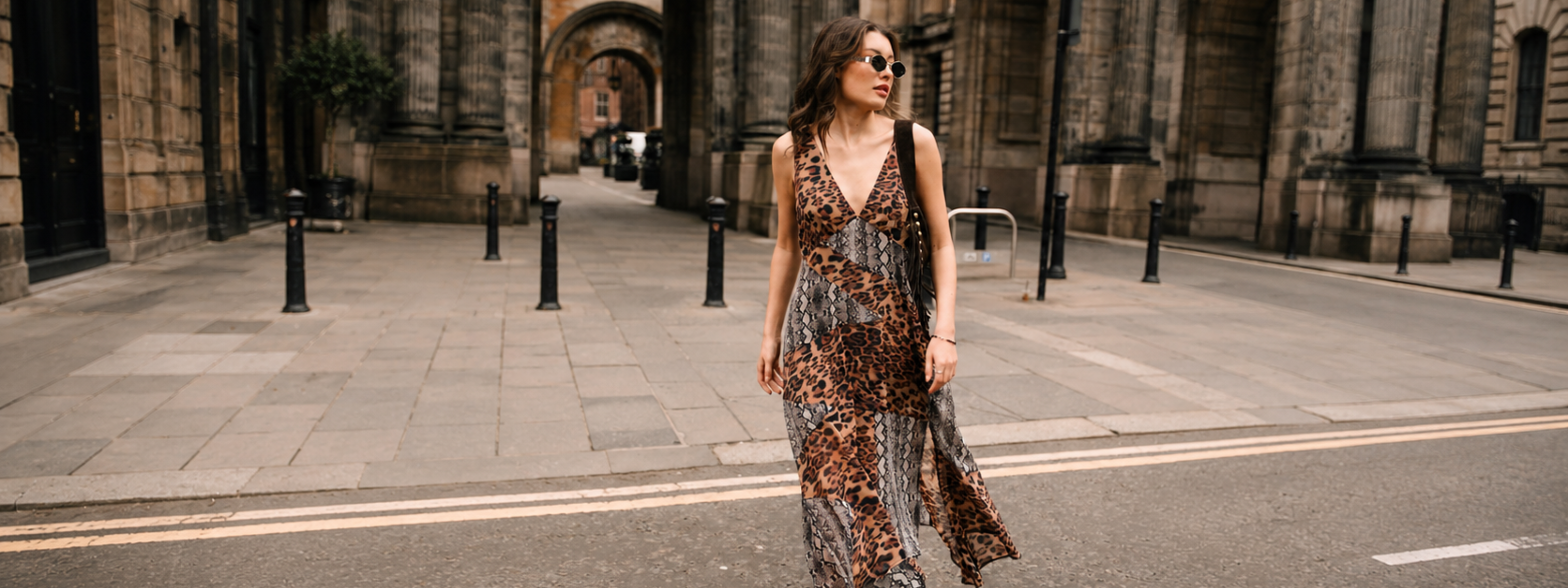 Little Lies Zadie Animal Handkerchief Dress in patchwork leopard and snake print chiffon with deep V neckline, Glasgow street style.
