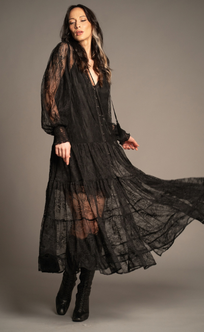 Rhiannon black lace unlined maxi dress with tiered skirt, sheer lace sleeves and tassel tie neckline front view