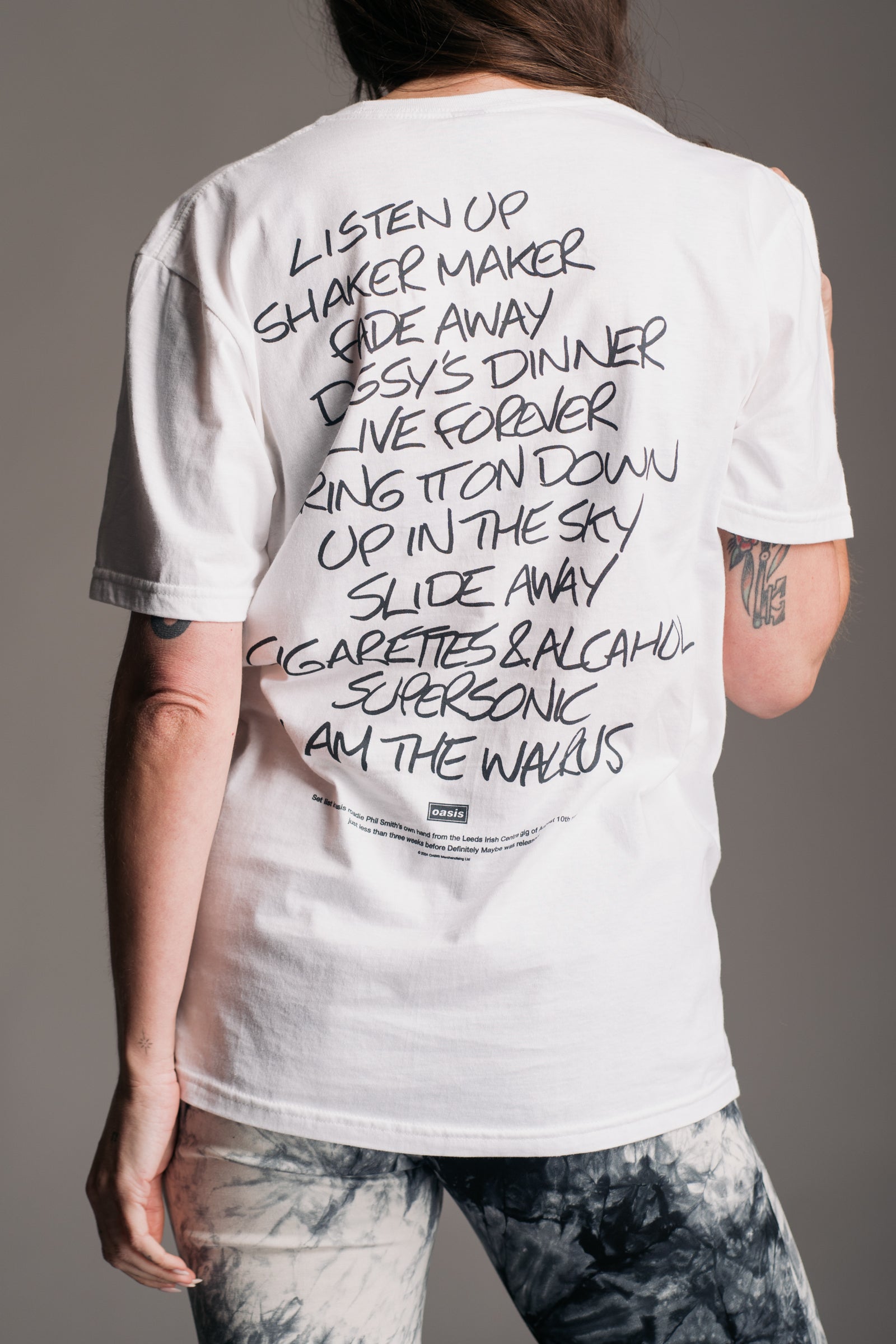 Oasis Setlist Band Tee featuring vintage-inspired tour setlist artwork, licensed graphics and a relaxed oversized fit