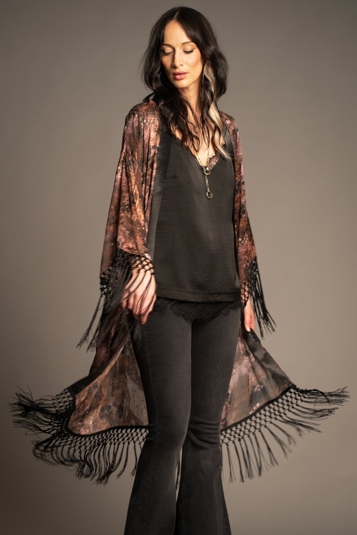 Practical Magic kimono with vintage floral print, open front design and black tassel fringe trim front view