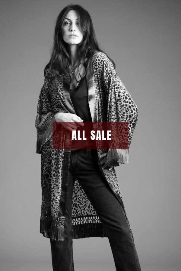 Little Lies Heartbreaker kimono with leopard print and fringe trim styled with black top and jeans featured in all sale promotion