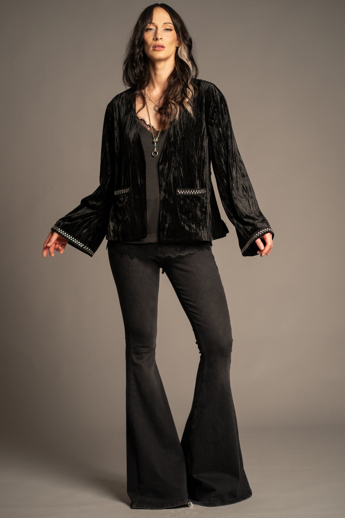 Silver Springs studded velvet jacket in black featuring an open front, silver stud trim and crushed velvet texture