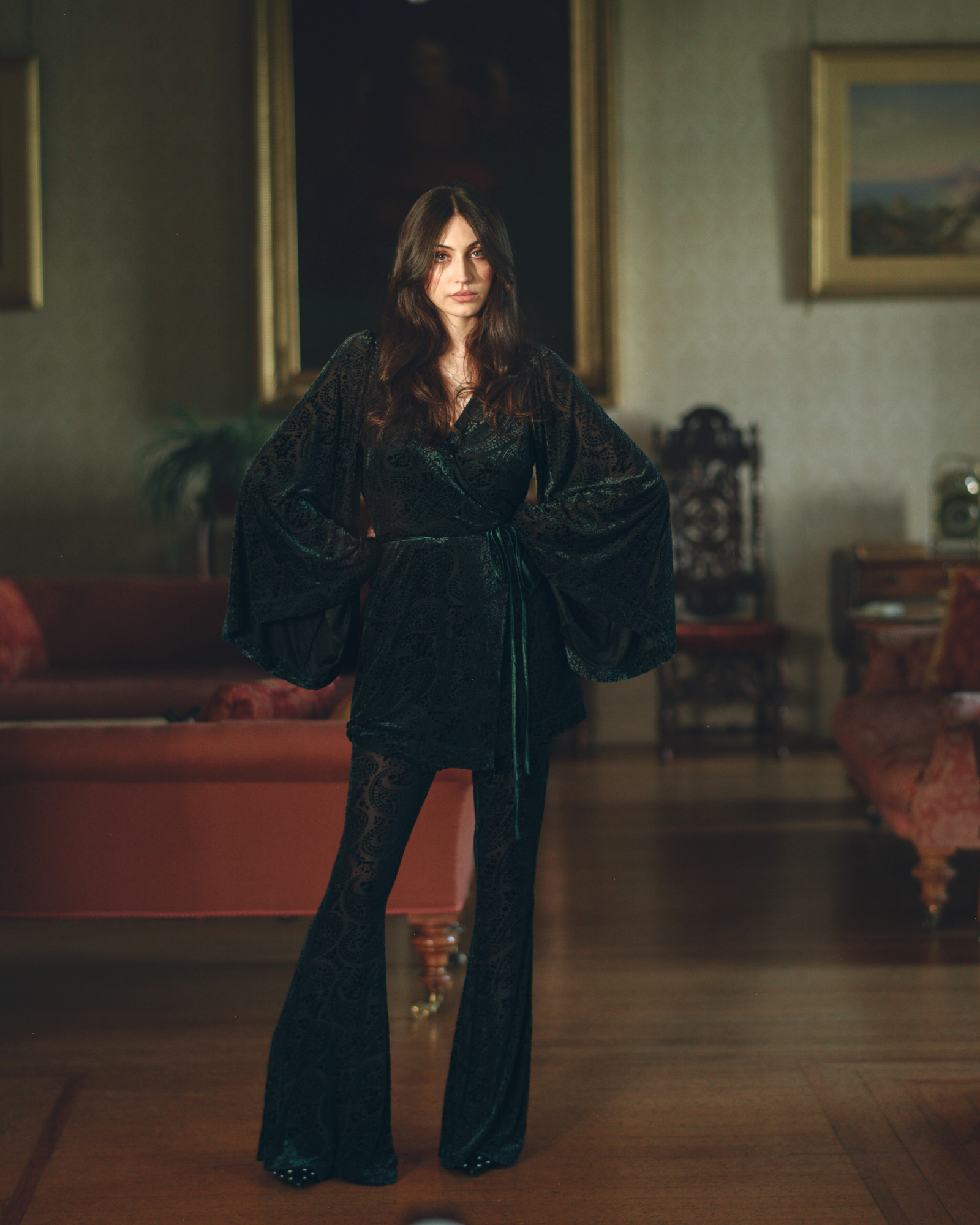 Model wearing Siren Teal Velvet Wrap Dress and Teal Velvet Flares