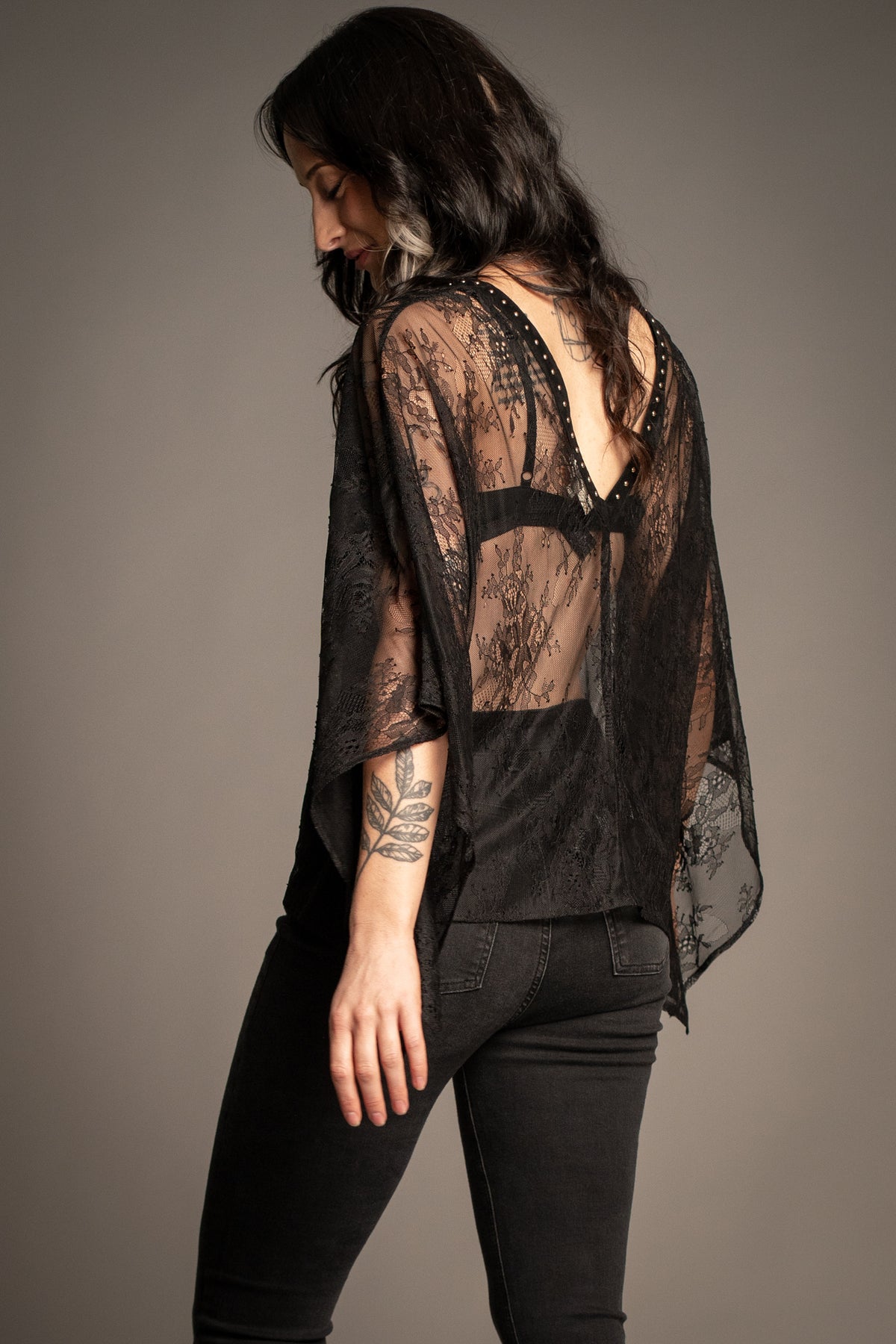 Spellbound studded lace kimono top back view showcasing sheer floral lace, draped silhouette and oversized kimono sleeves
