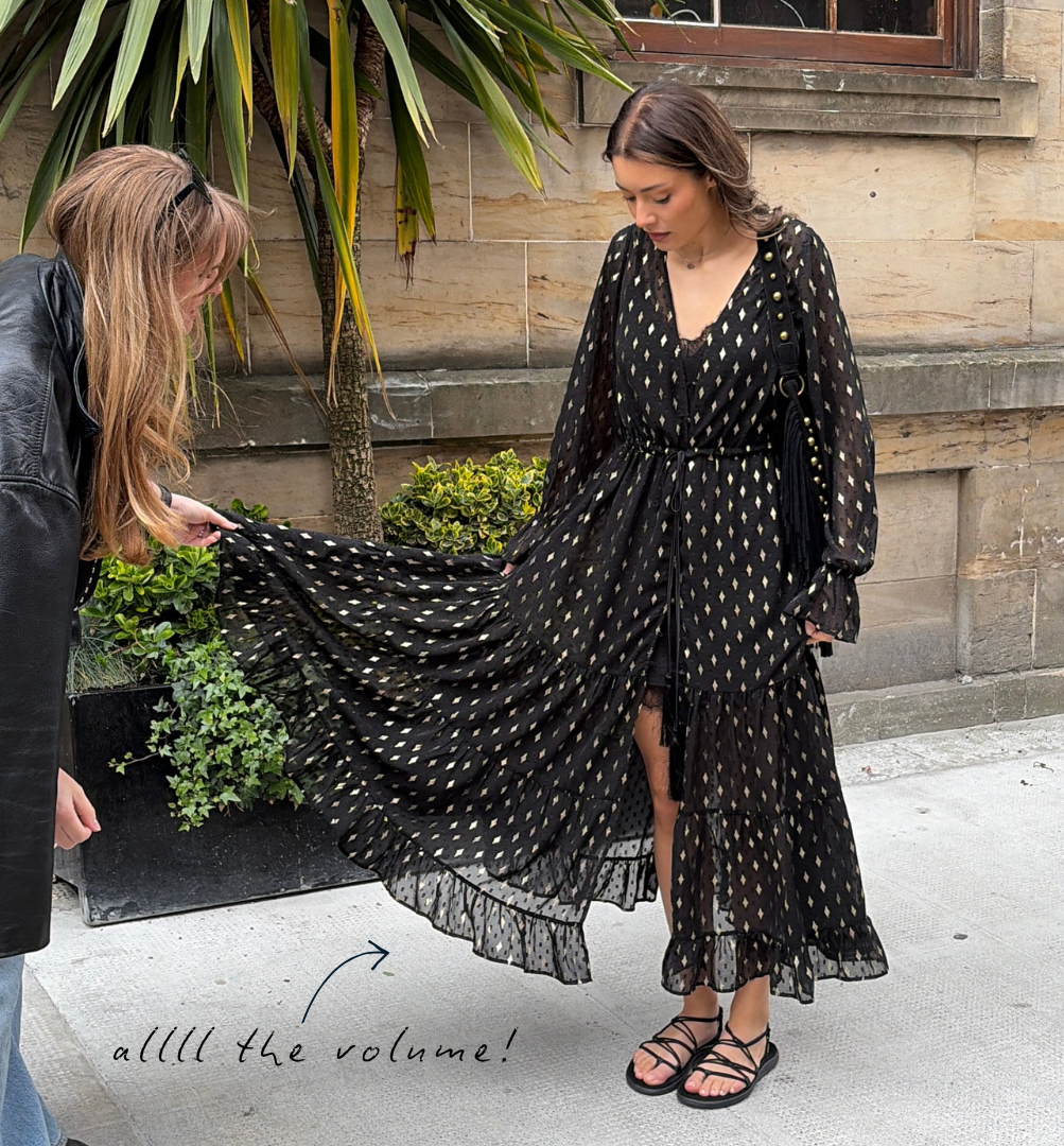Model wearing Space Oddity Metallic Maxi Dress with Willow Black Fringed Studded Bag.