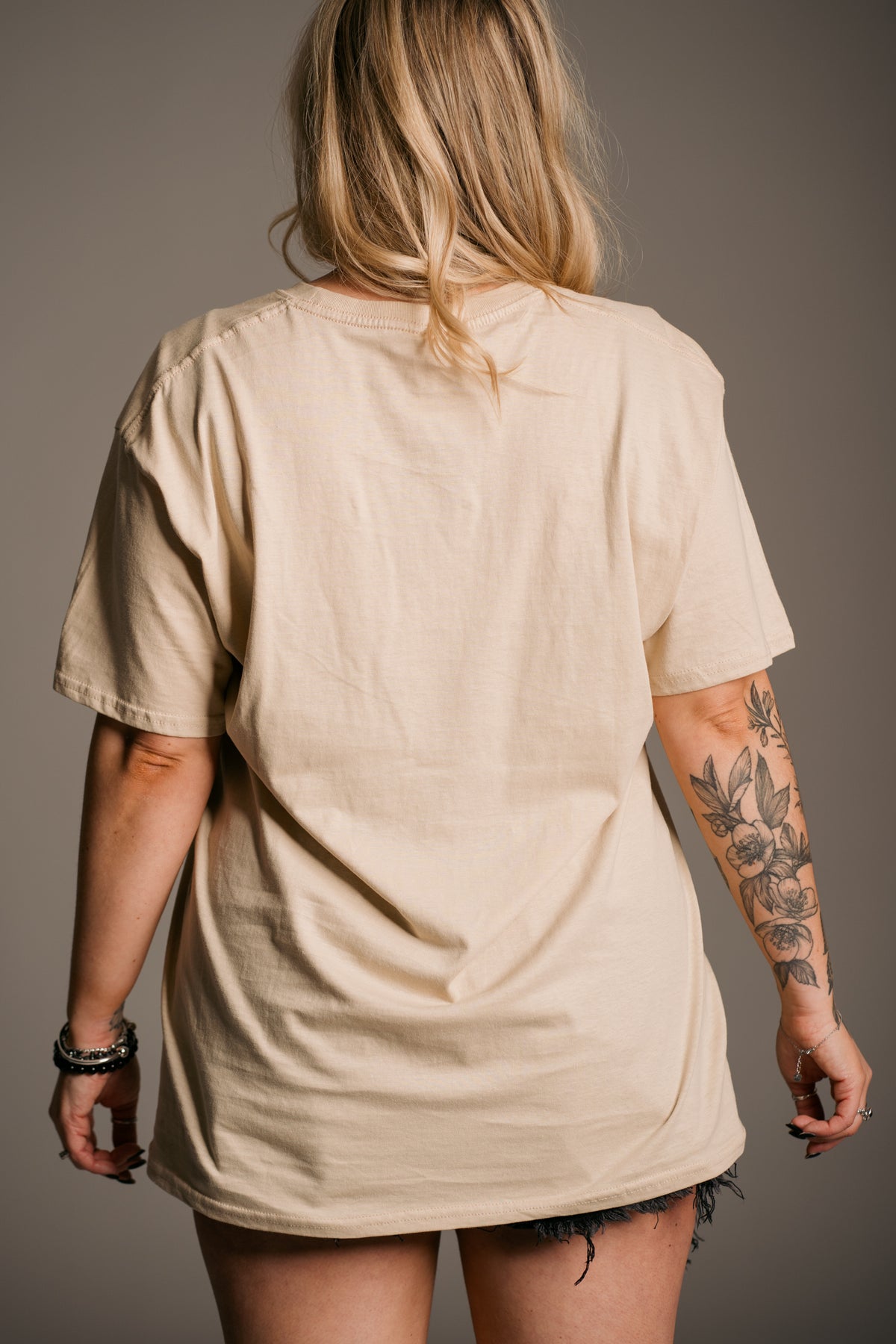 Back view of Tom Petty Wildflowers Band Tee in relaxed easy fit from Little Lies