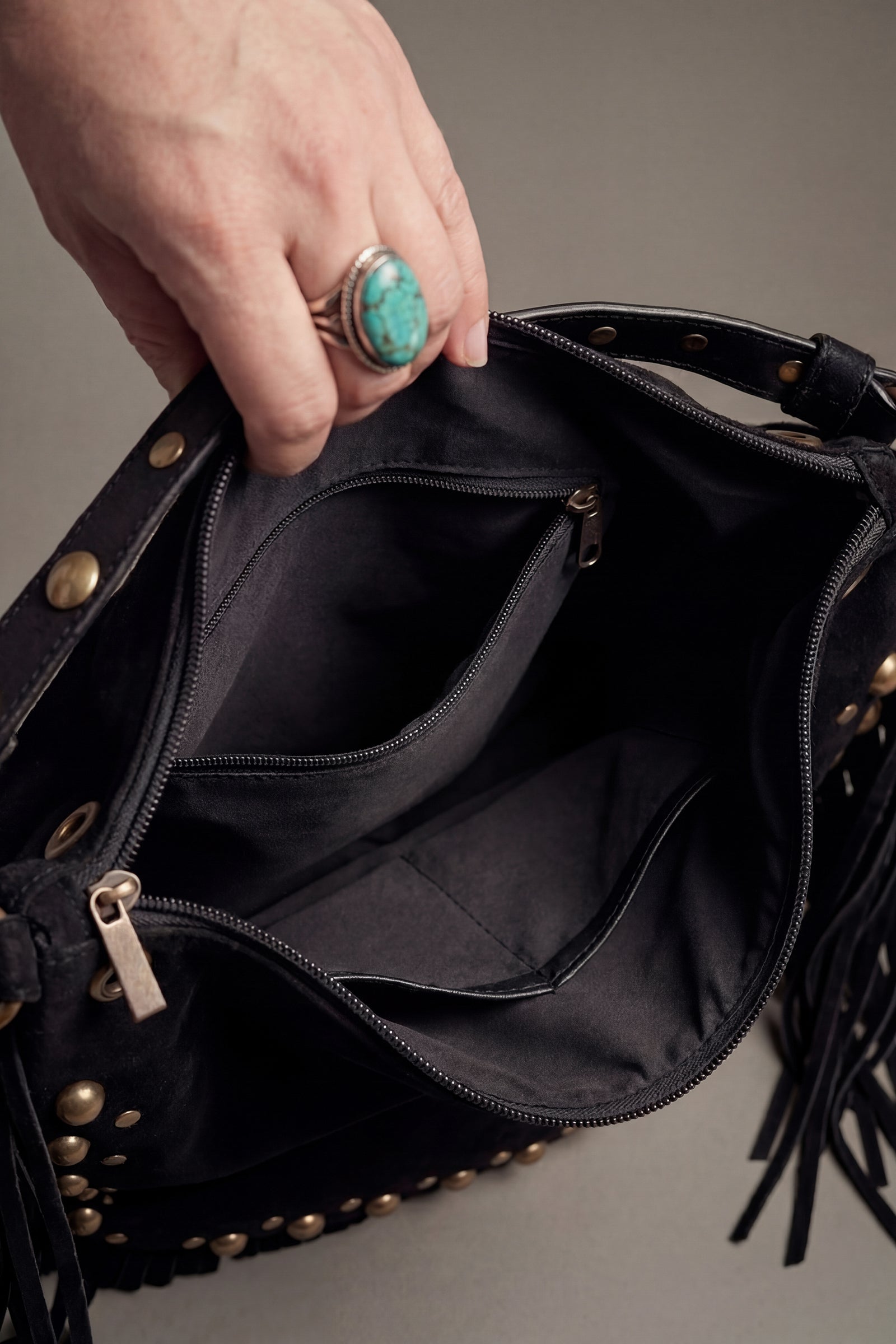 Inside view of Willow black fringe slouchy shoulder bag