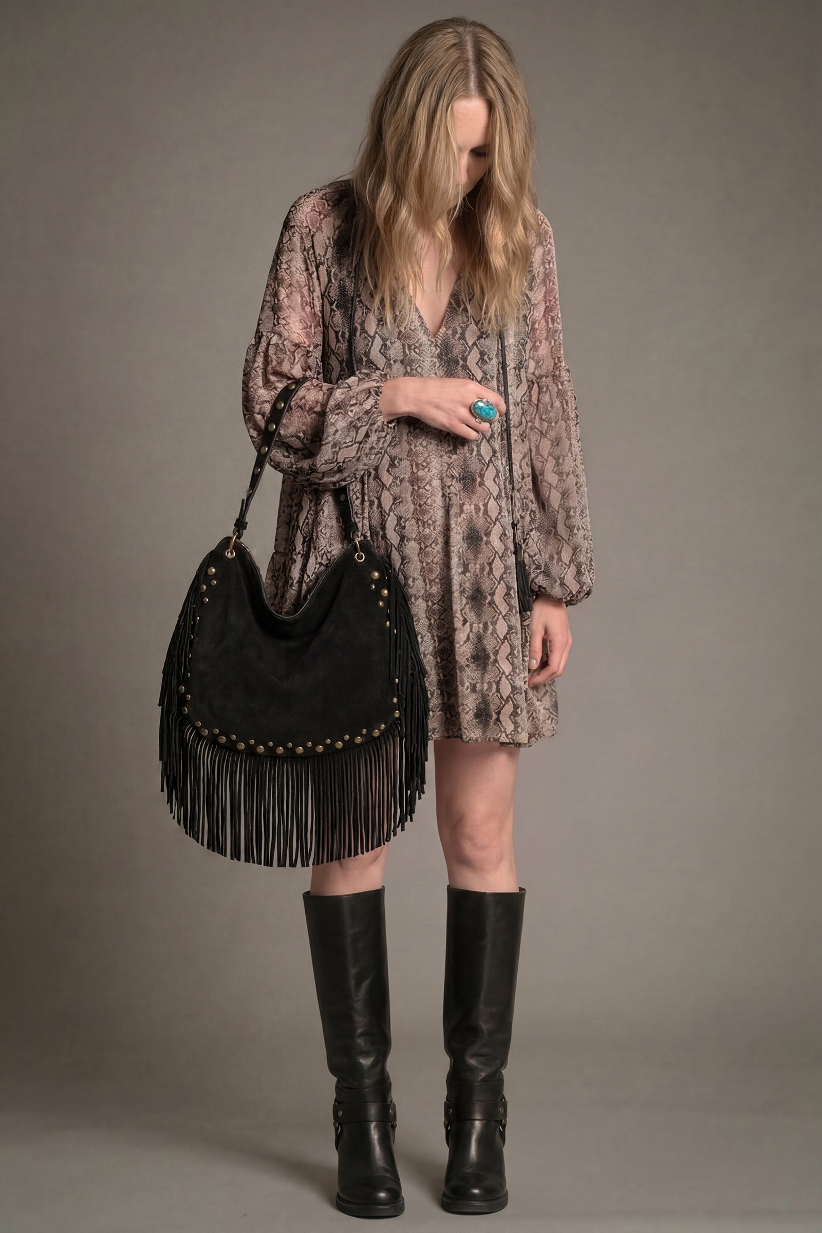 Willow black studded fringe slouchy bag styled with Seeker Snake Midi Dress