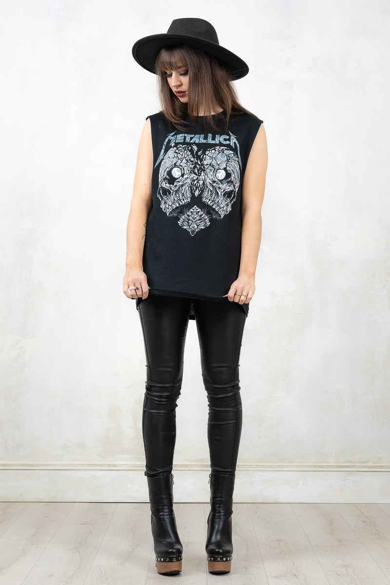 Model wearing Metallica Heartbreaker Vest, a black metallica band tee vest