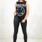Model wearing Nirvana Smiley Vest - black nirvana band tee vest
