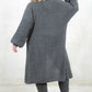 Model wearing All Apologies Charcoal Cardigan - Charcoal oversized knit cardigan , Open front with true pockets