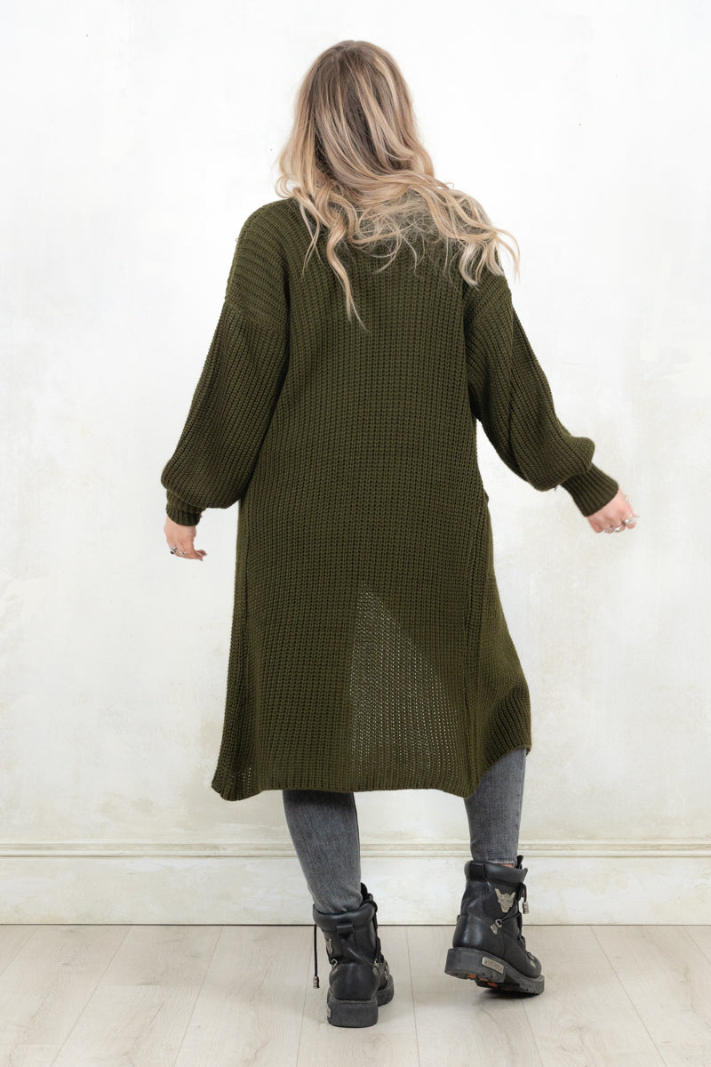 Model wearing khaki, relaxed fit, pen front cardigan with true pockets