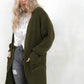 Model wearing khaki, relaxed fit, pen front cardigan with true pockets