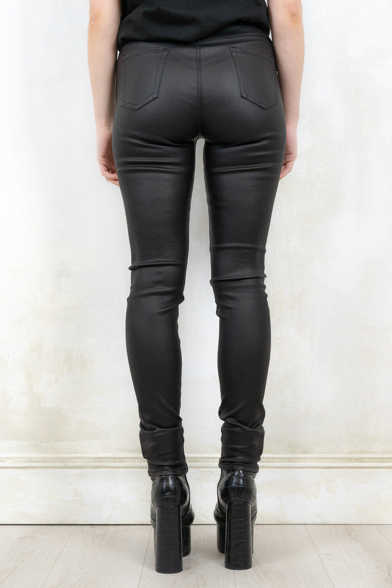 Model Wearing Edge of Darkness Skinnies - Black Skinnies with Front button and zip closure with true pockets