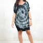 Model wearing Stormbringer Tue Dye T-Shirt Dress- Tie dye t-shirt dress with slouchy silhouette, ultra soft fabric and open back detail 