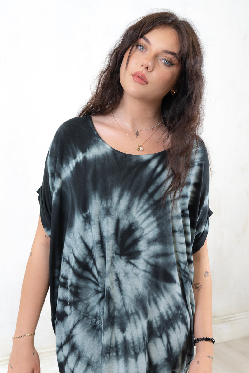 Model wearing Stormbringer Tue Dye T-Shirt Dress- Tie dye t-shirt dress with slouchy silhouette, ultra soft fabric and open back detail