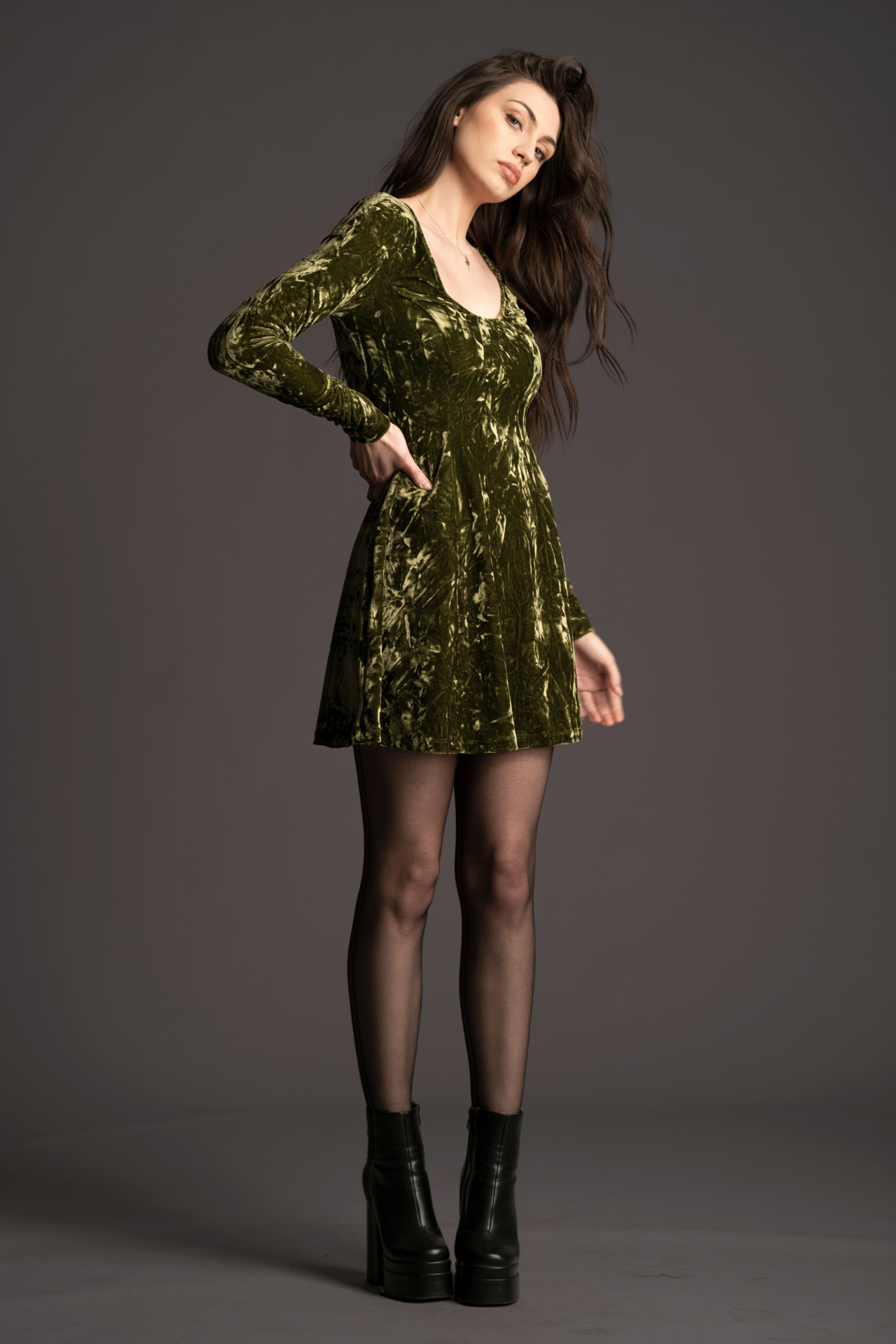 Andie wearing the iconic Sweet Jane Olive Crushed Velvet Mini Dress