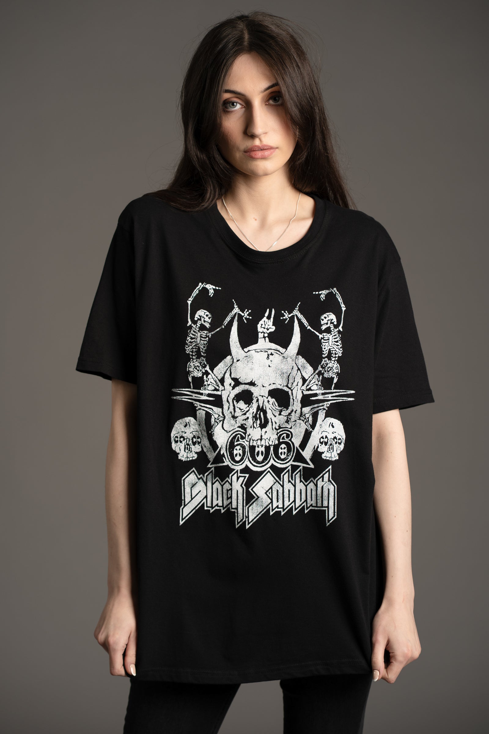 Front view of the Black Sabbath Dancing Band graphic tee in black featuring skull and skeleton motif from Little Lies collection