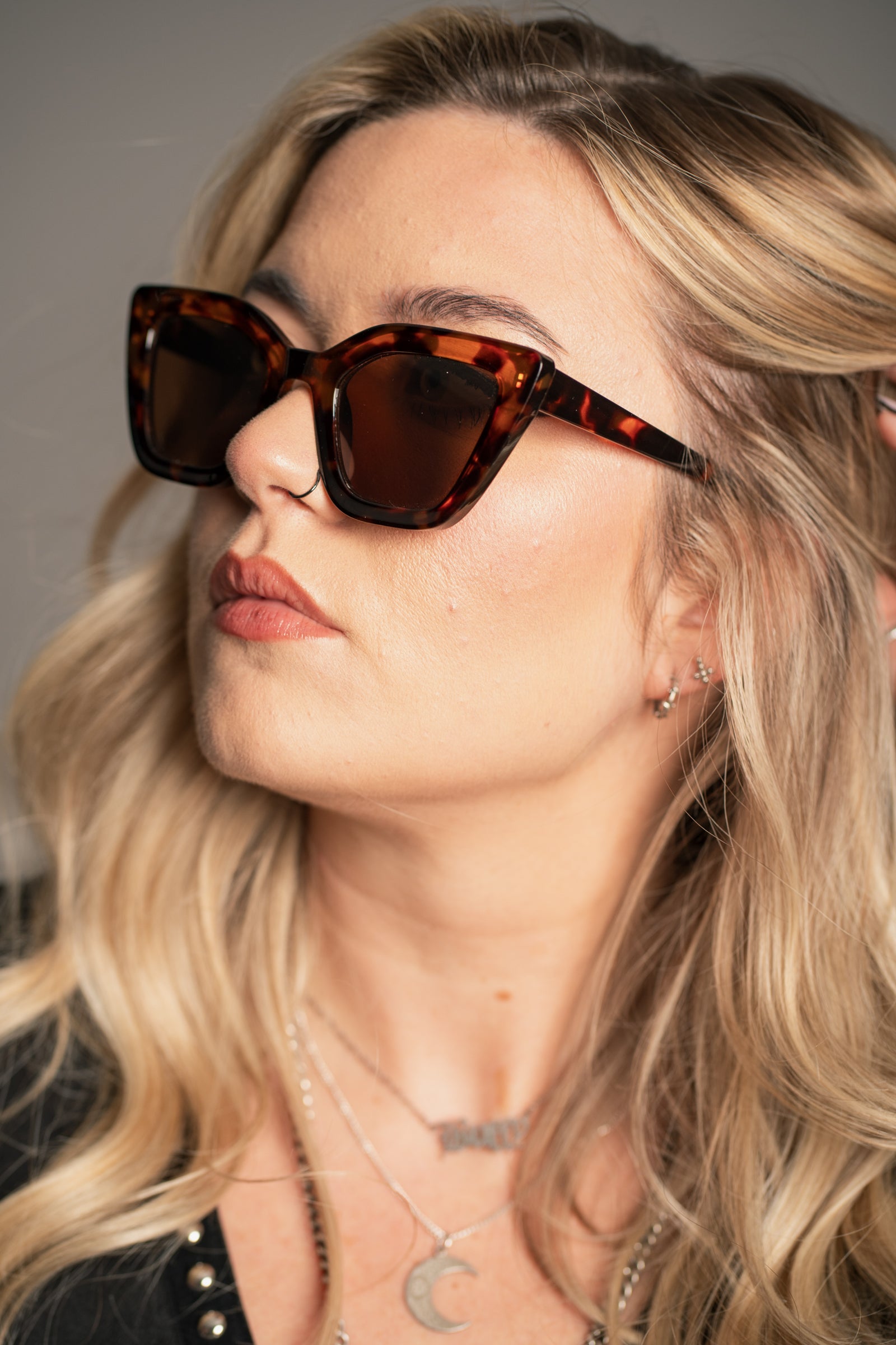 Little Lies cat eye sunglasses in tortoiseshell finish with glossy frame and tinted lenses