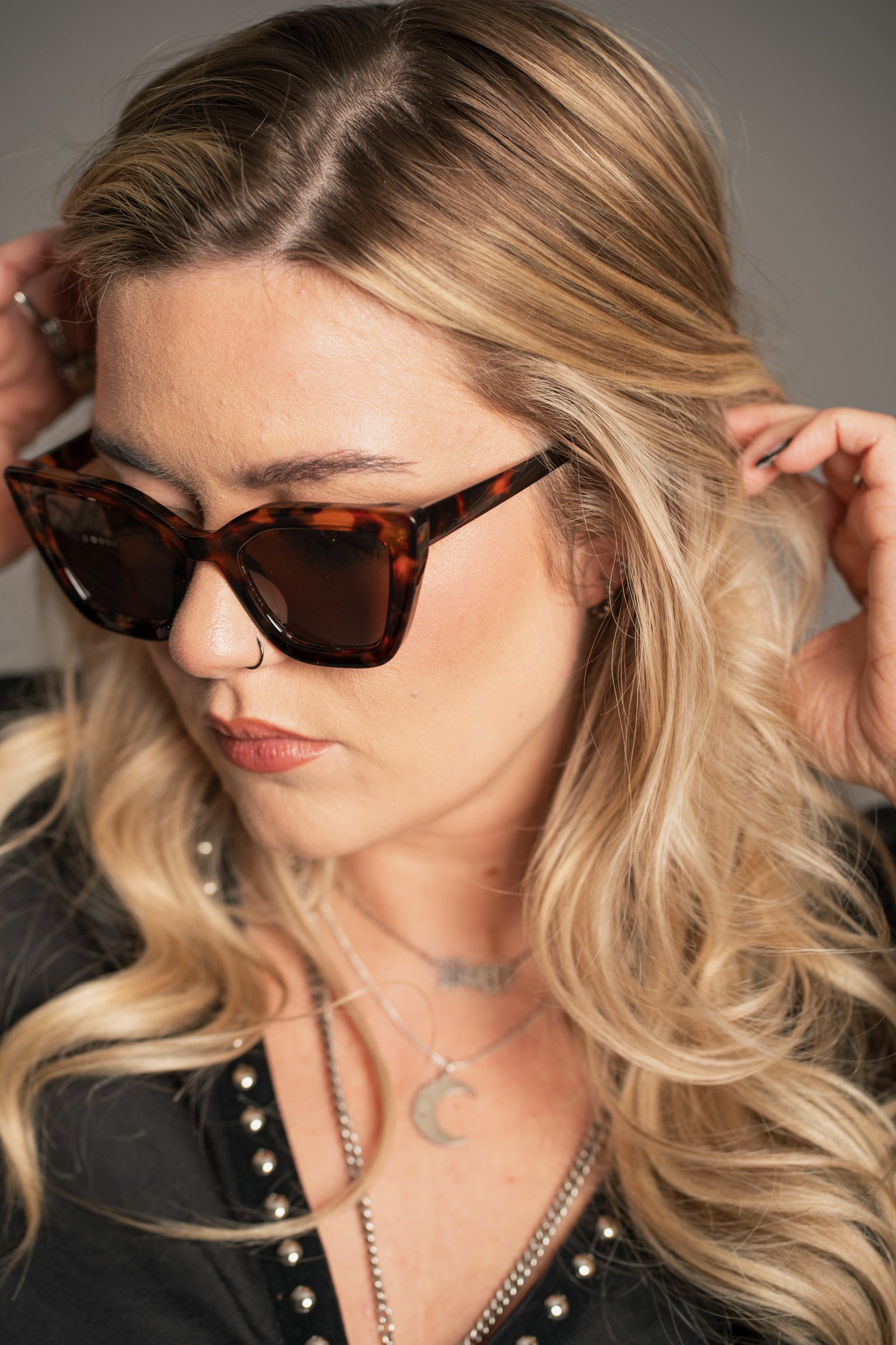 Little Lies tortoiseshell cat eye sunglasses with angular frame and dark tinted lenses