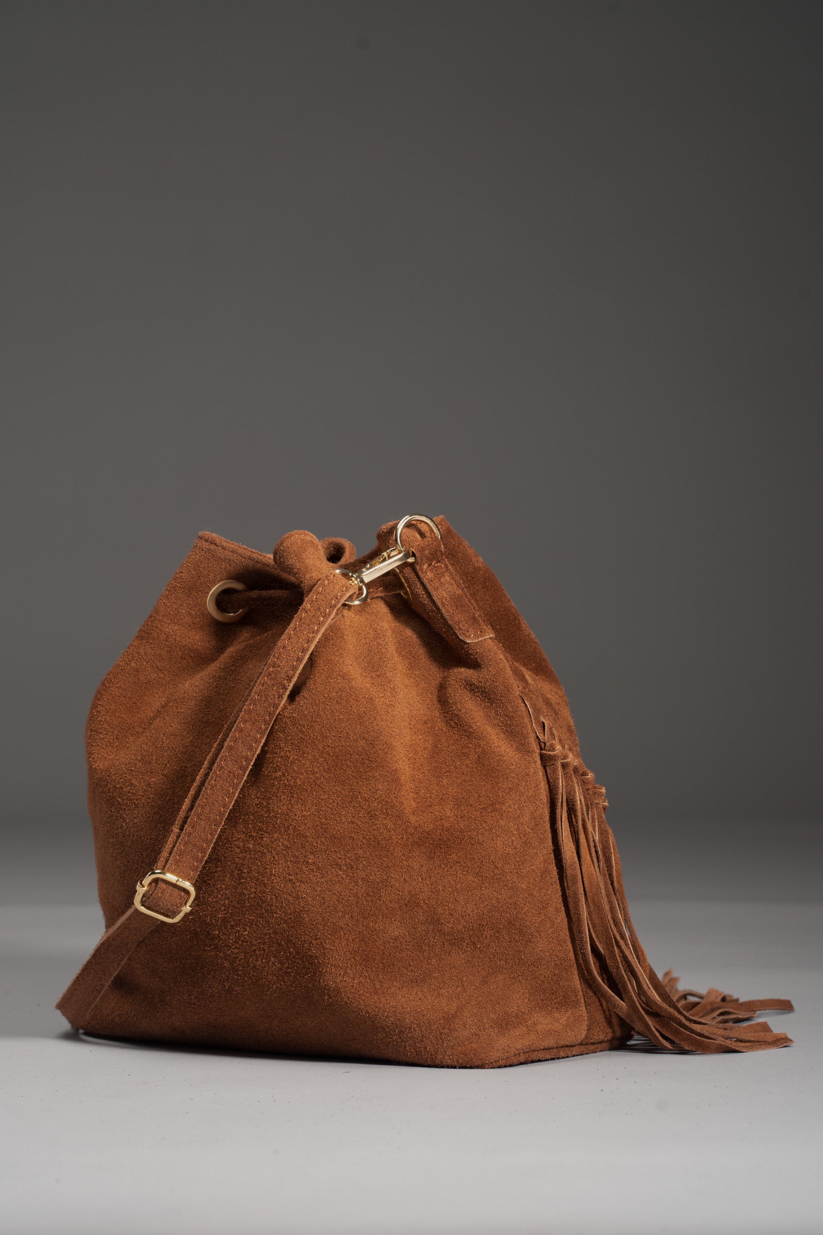 Tan suede on sale bucket bag