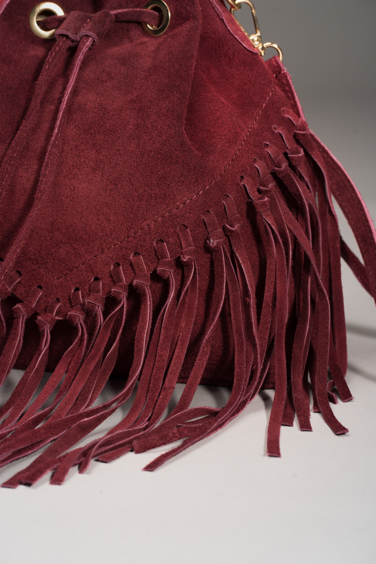 Burgundy suede on sale bucket bag