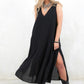 Model wearing Ramble On Midi Dress- Black tassel tie midi dress. With three ways to tie, Ramble On gives the options of a trapeze silhouette, empire fit or a cinched in waist.