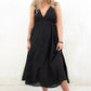 Model wearing Ramble On Midi Dress- Black tassel tie midi dress. With three ways to tie, Ramble On gives the options of a trapeze silhouette, empire fit or a cinched in waist.