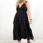 Model wearing Ramble On Midi Dress- Black tassel tie midi dress. With three ways to tie, Ramble On gives the options of a trapeze silhouette, empire fit or a cinched in waist.
