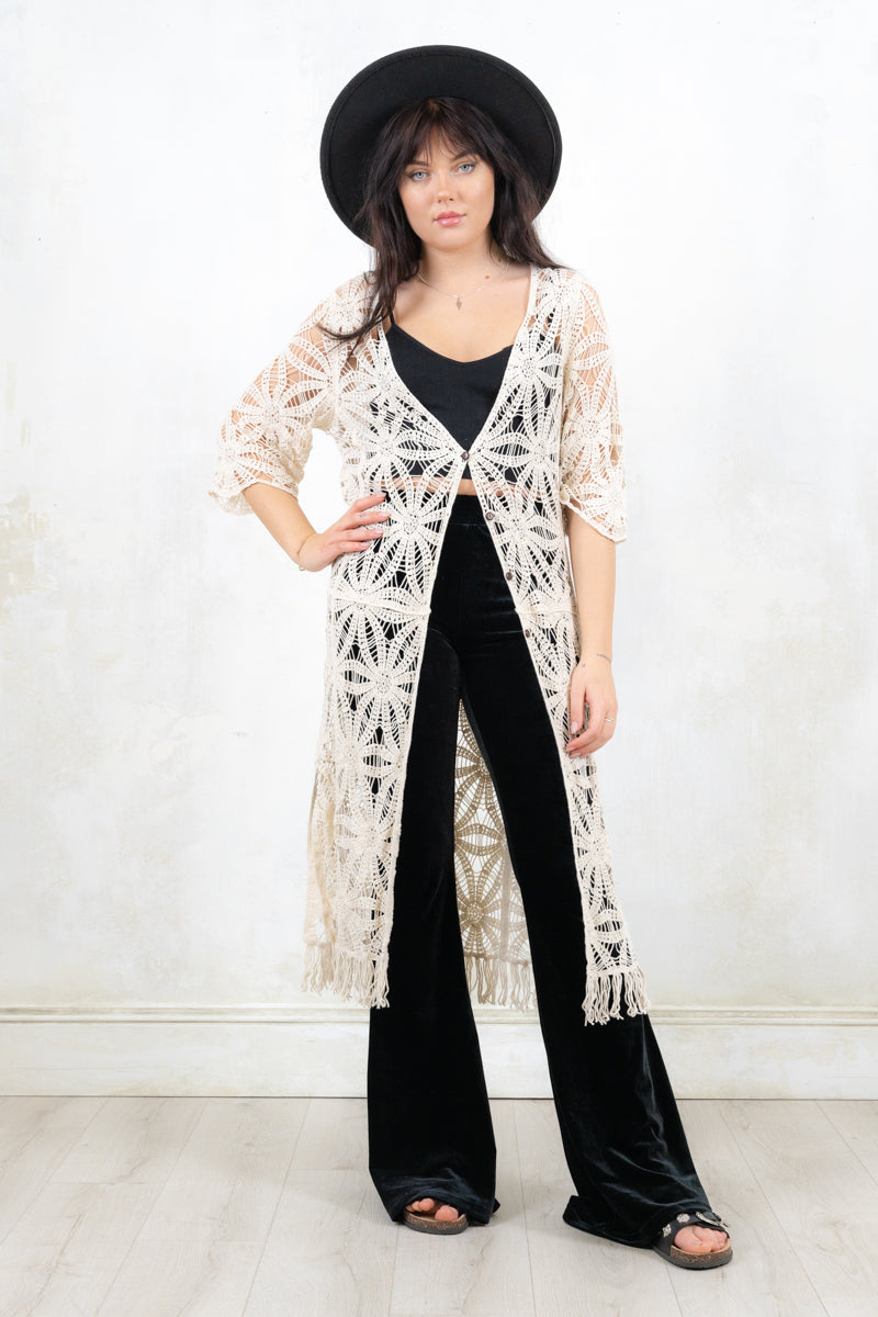 Model wearing Let It Be Crochet Kimono - Cream Crochet Kimono, Buttoned front with fringed hem