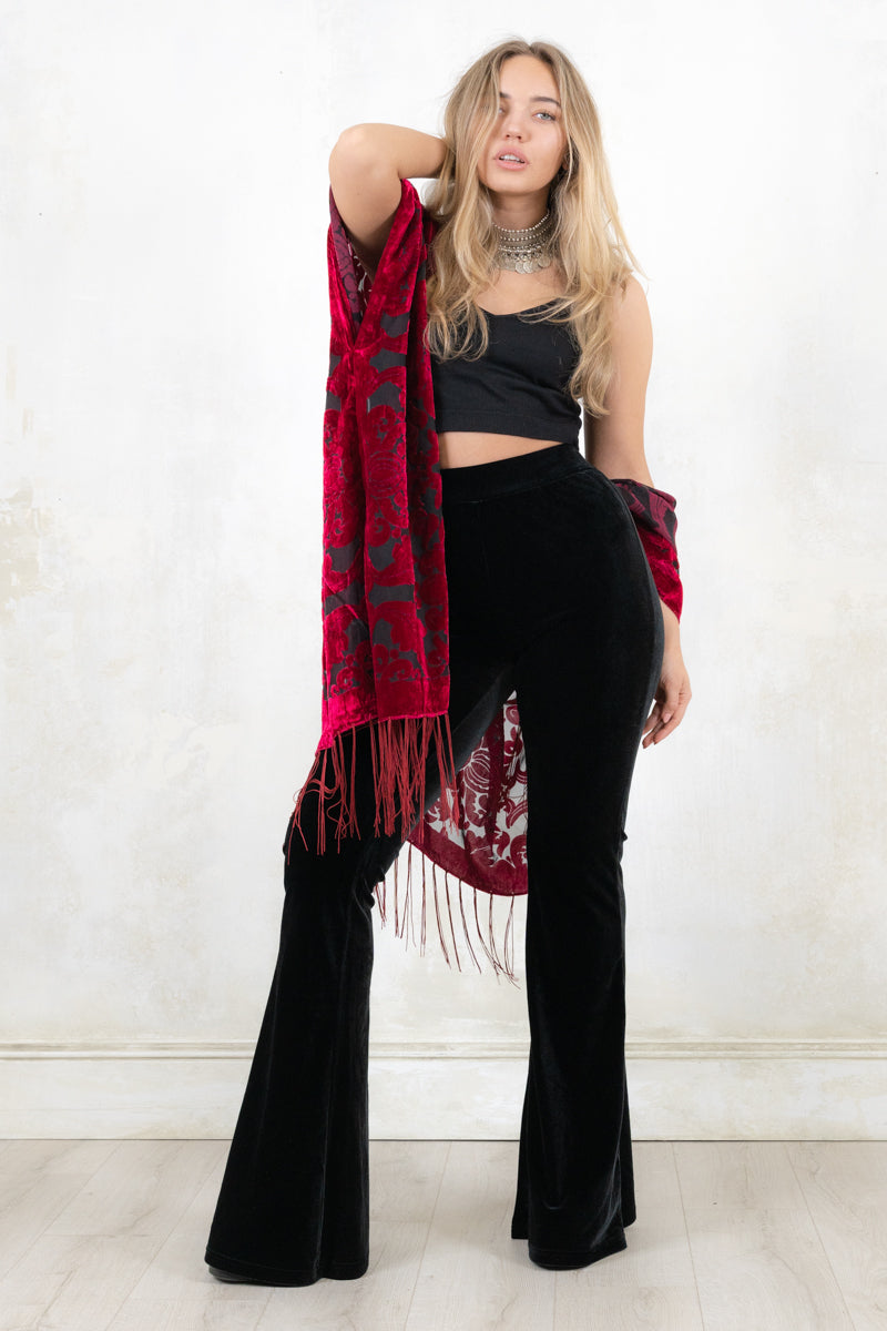Model wearing Mystic Queen Raspberry Devore Kimono - raspberry devore burnout velvet kimono with a relaxed shape adorned with fringing