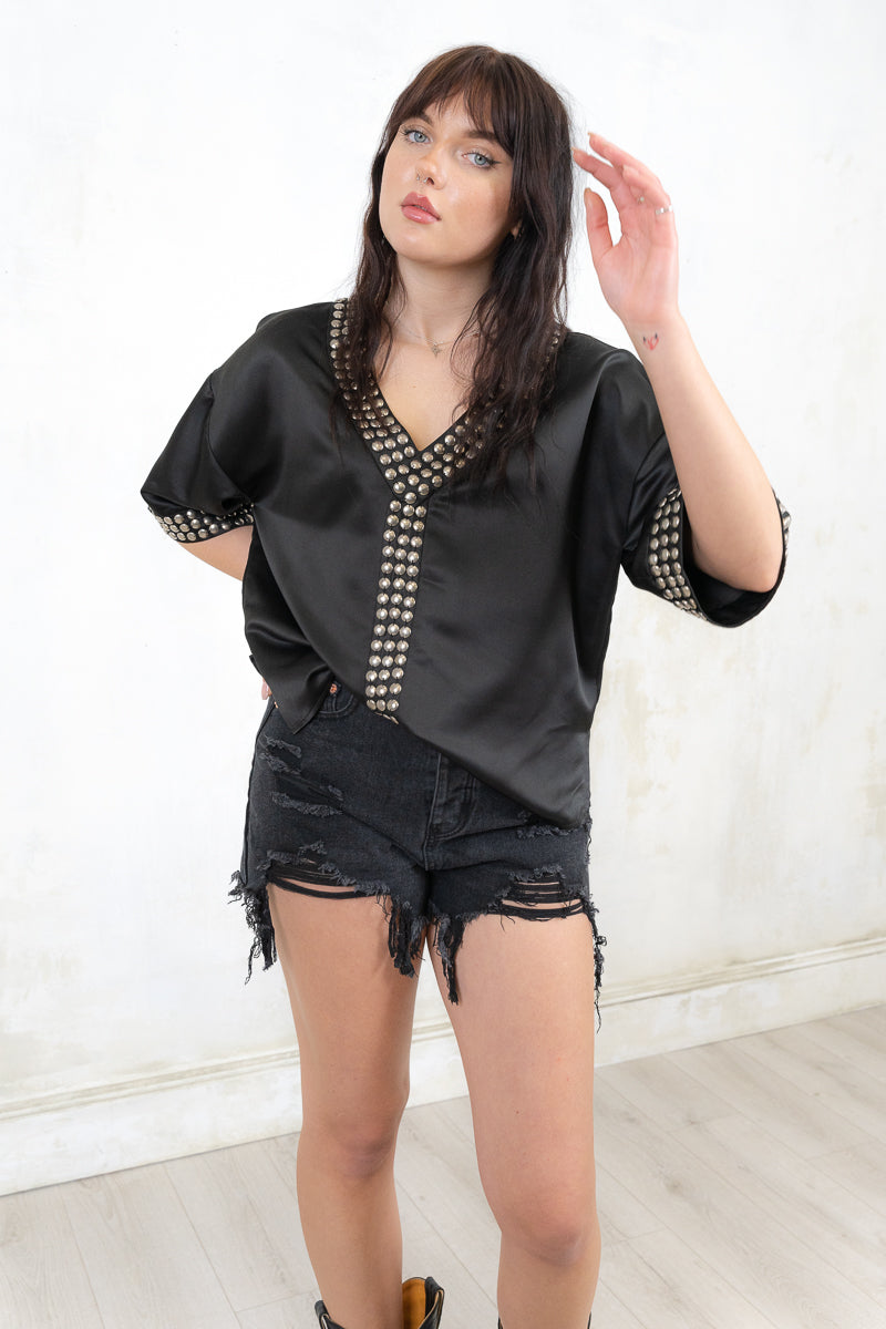 Model wearing Heavy Metal Studded Tee- Relaxed fit, black satin boxy tee with silver Embellishment