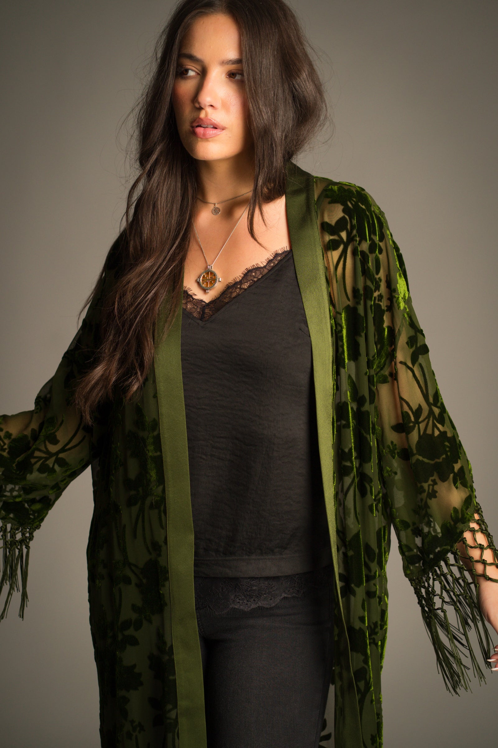 Close-up of Little Lies Dakota kimono neckline showing sheer olive devore fabric with soft velvet floral texture and satin trim