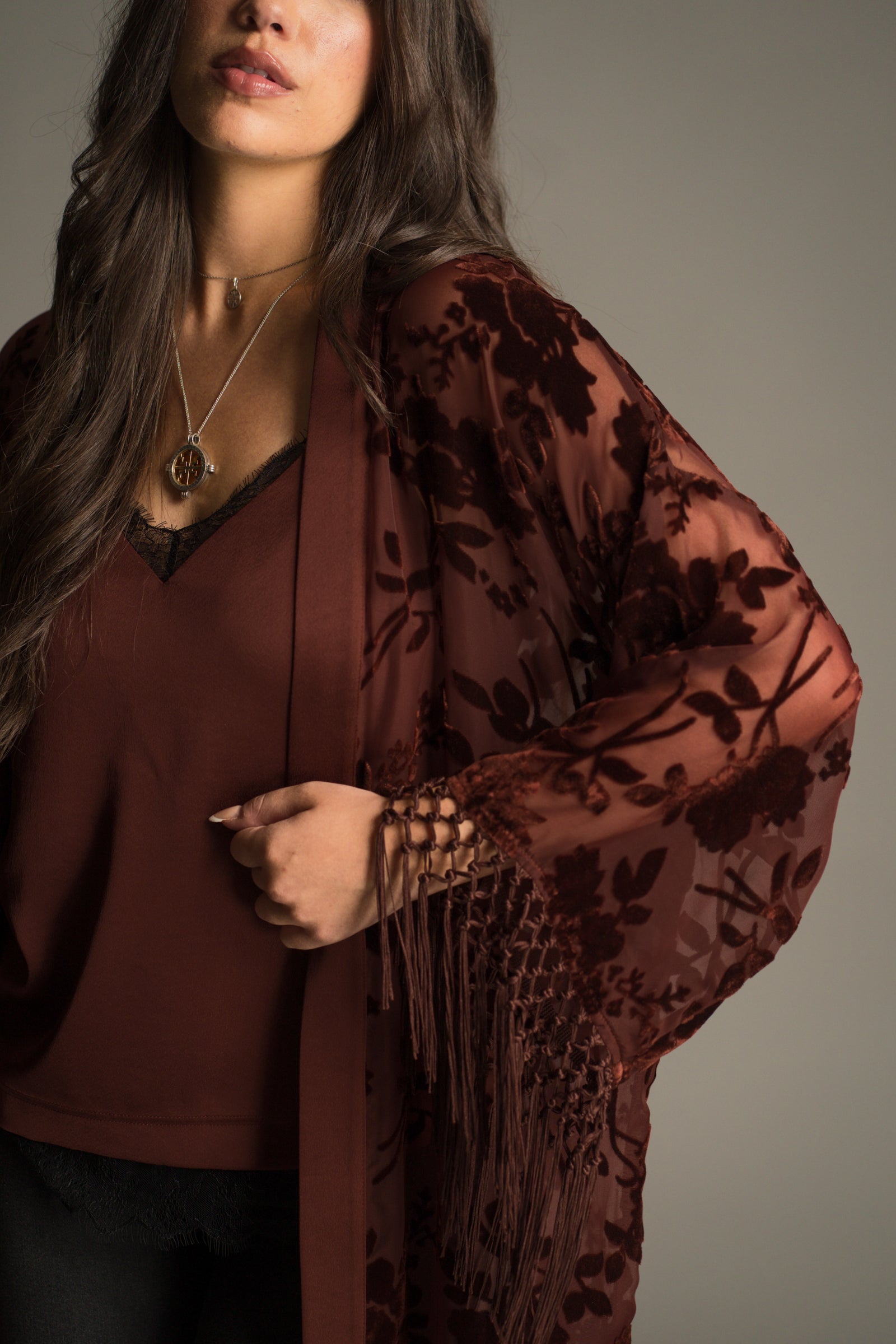 Dakota Rust Devore Kimono showing fringed sleeve detail.